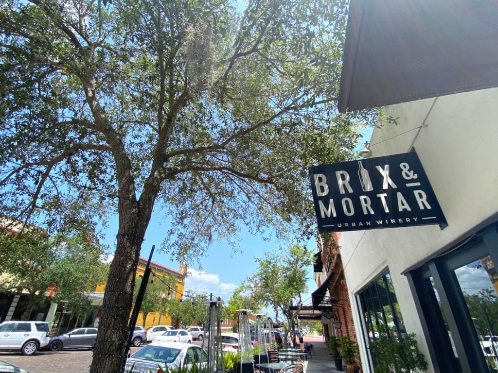 exterior and outdoor seating of Brix and Mortar Winery in Sanford