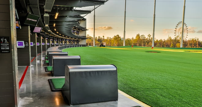 Teeing it up at Topgolf Orlando - The Orlando Duo