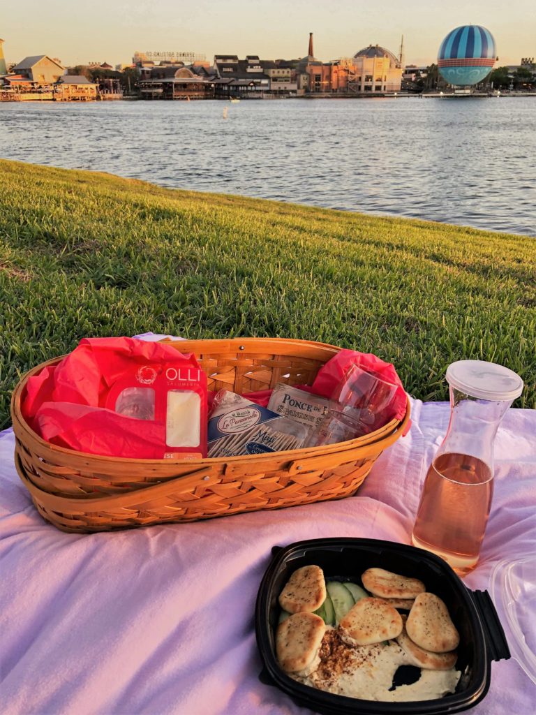 Enjoying a Wine Bar George Picnic with a view of Disney Springs