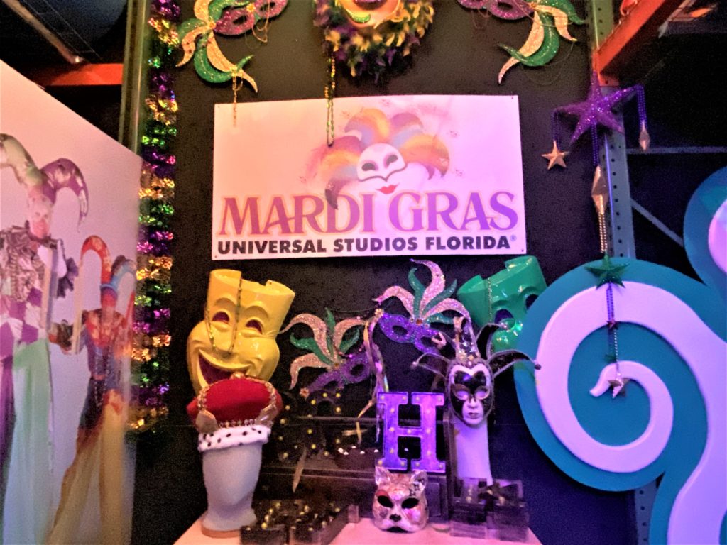 Universal Mardi Gras 2022 Tribute Store includes displays of props from past years of Mardi Gras