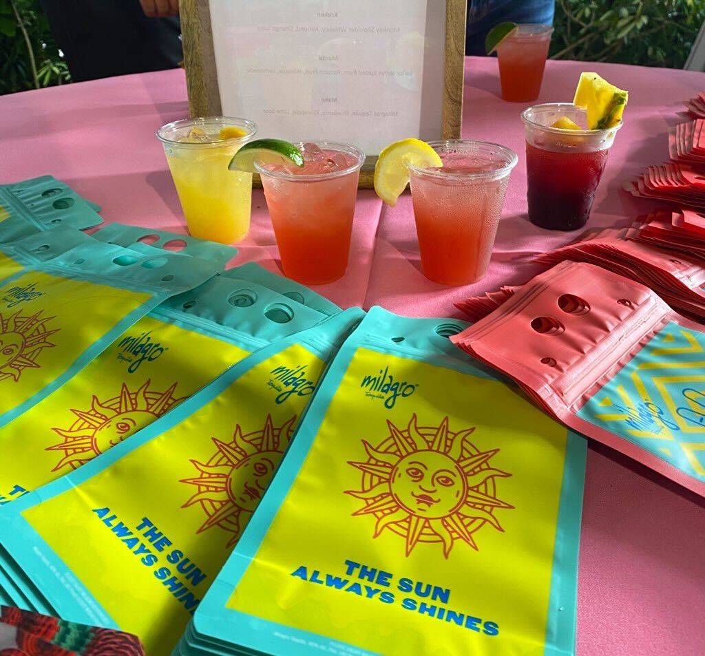 SeaWorld Coaster Cocktails on a table with a pink tablecloth