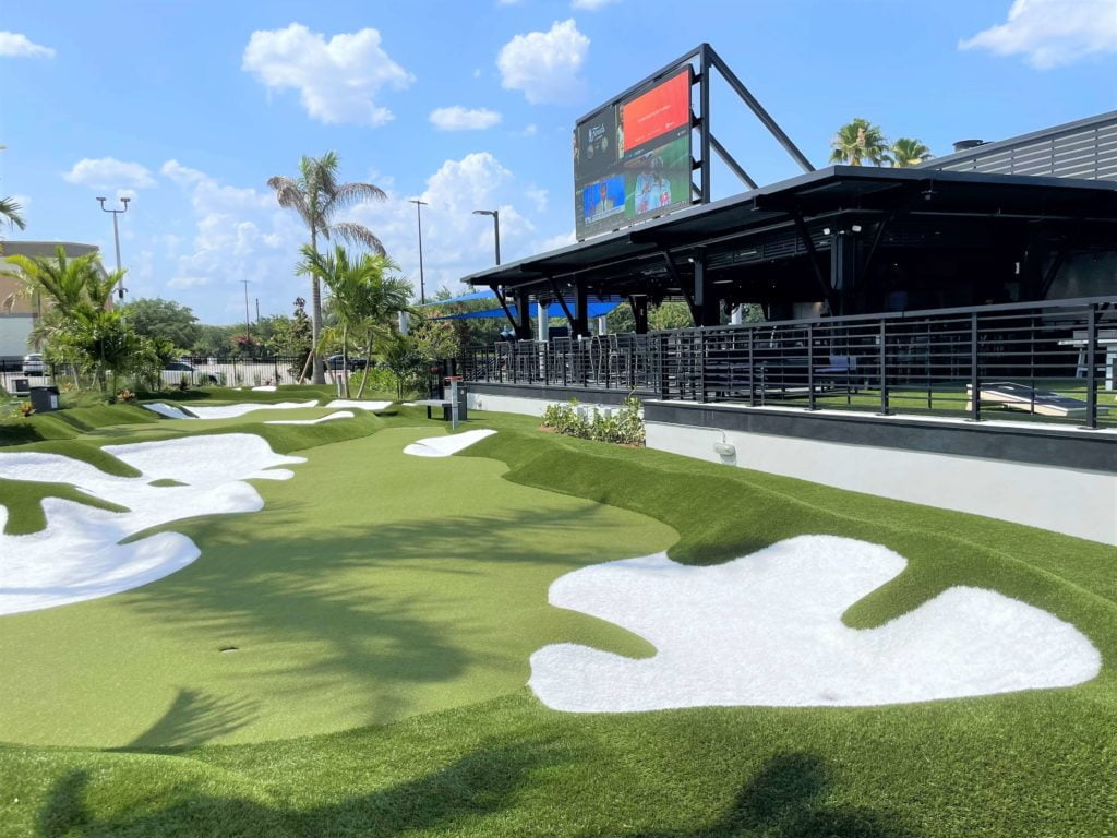 Sports Video Screen and Putting Hole at PopStroke Orlando Waterford Lakes