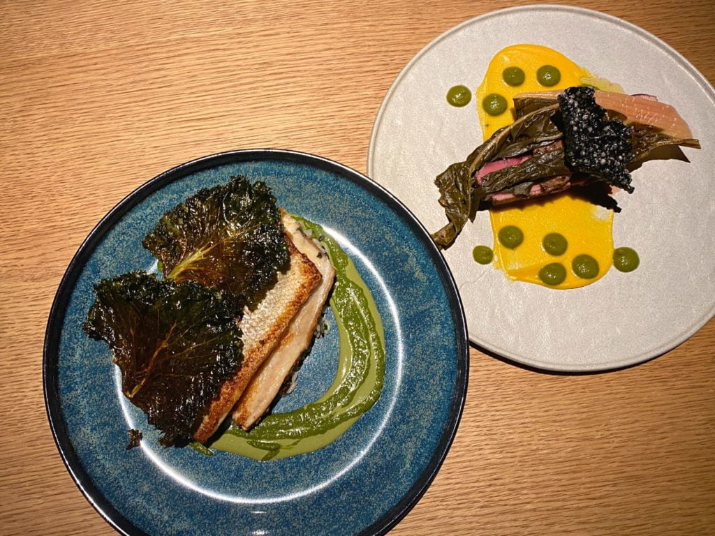 Entrées de branzino et de magret de canard au restaurant BACAN 