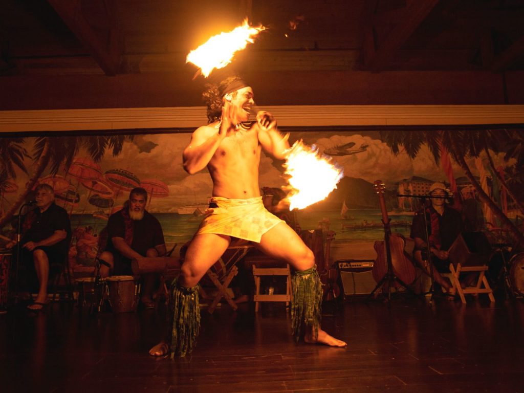 a fire dancer at Loews Royal Pacific Resort Wantilan Luau in orlando