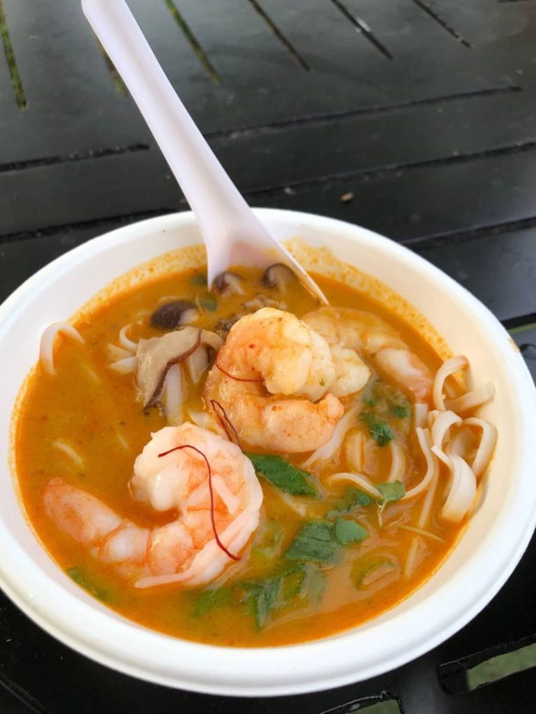 a bowl of Thai Shrimp and Coconut-Curry Rice Noodles at EPCOT Food and Wine 2021