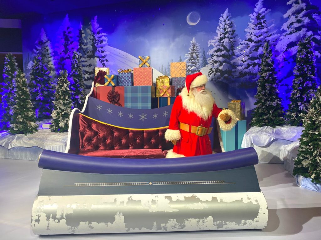 Santa at EPCOT inside The Odyssey Building 2022 