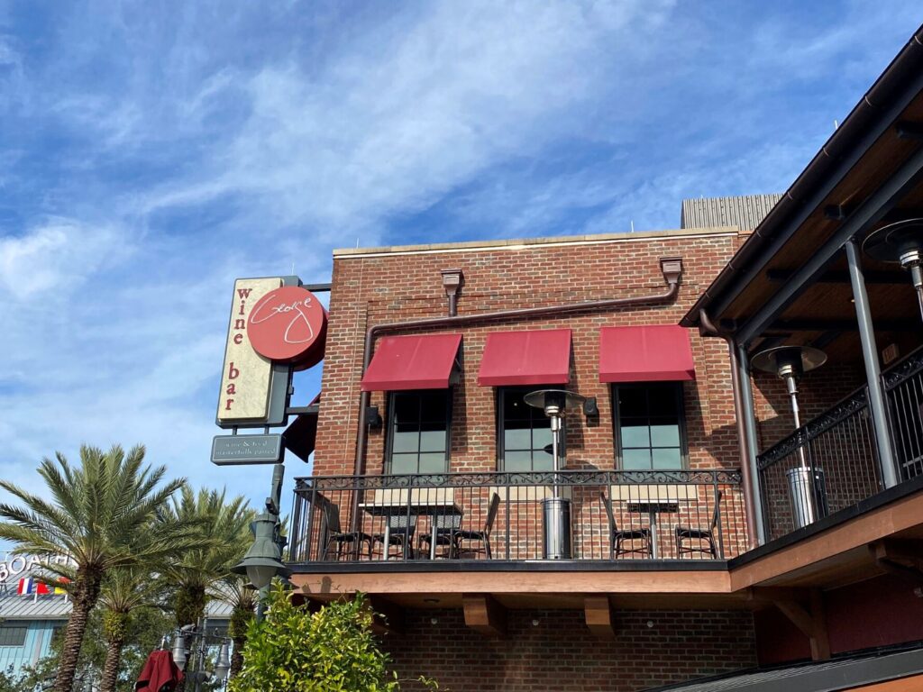 Disney Restaurants with Outdoor Dining Wine Bar George Disney Springs upstair balcony area - Dani Meyering