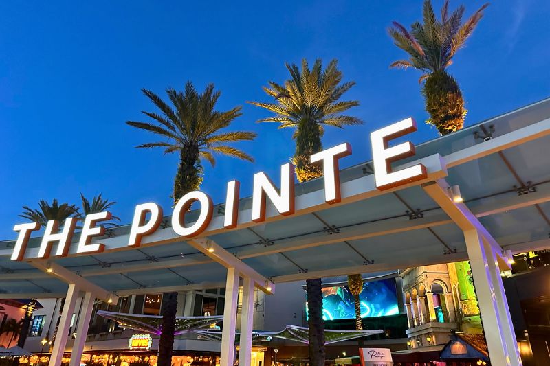 Pointe Orlando sign at night - image by Dani Meyering