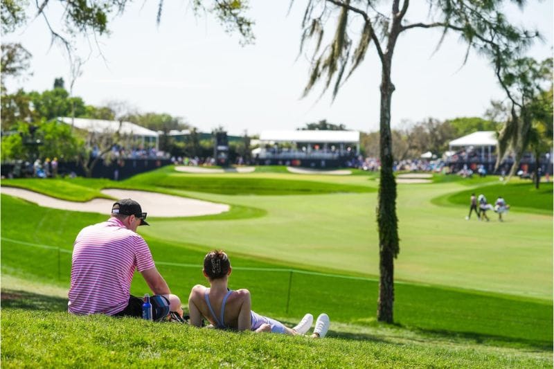 Couple relaxing at the Arnold Palmer Invitational